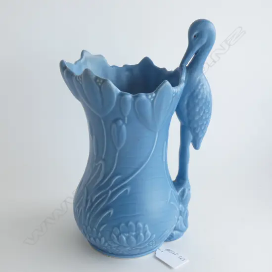 A Sylvac jug with stork handle Blue matt glaze